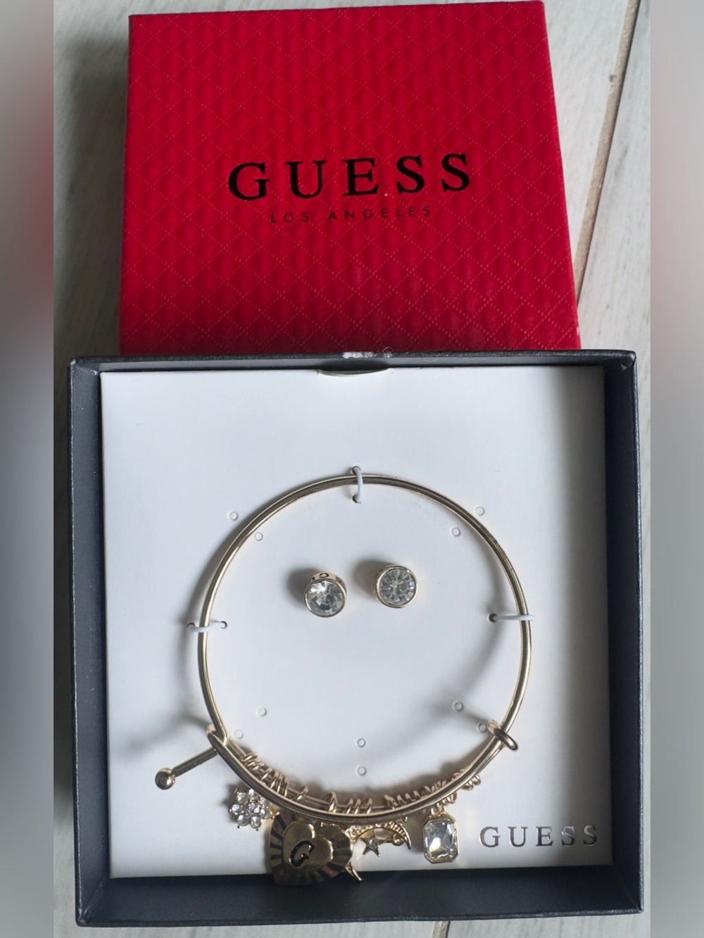 Guess Gold-Tone Charm Bangle Bracelet with Clear Crystal Studs